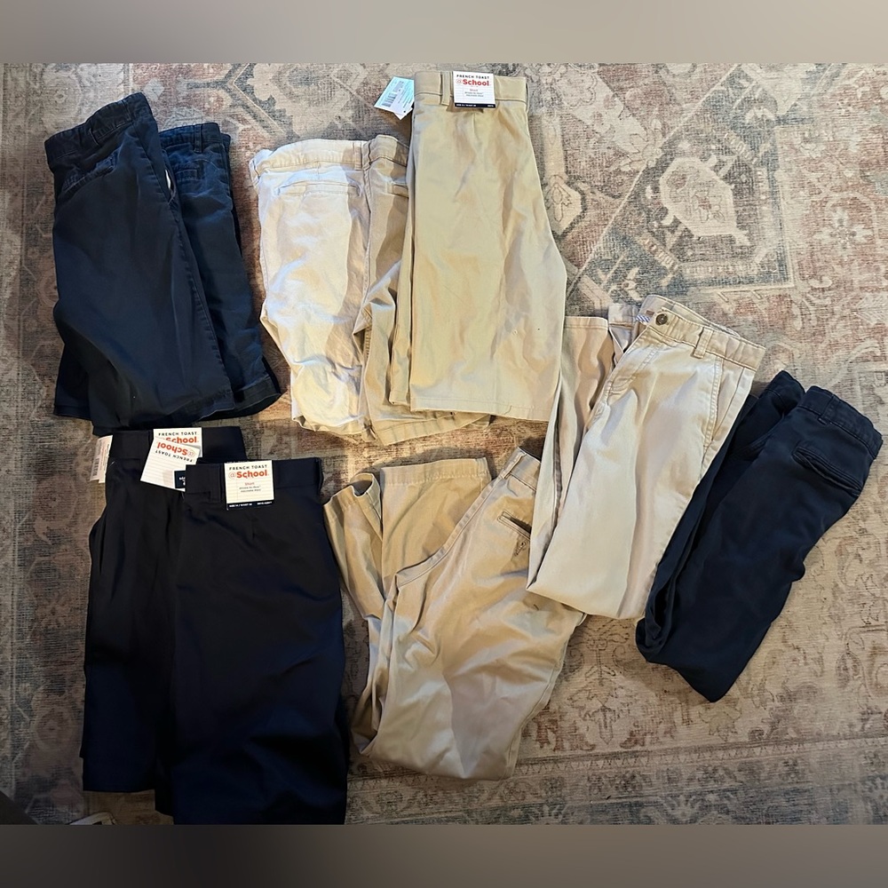 Boys size 14 uniform bottoms. 7 shorts (navy and khaki) and 3 pants
